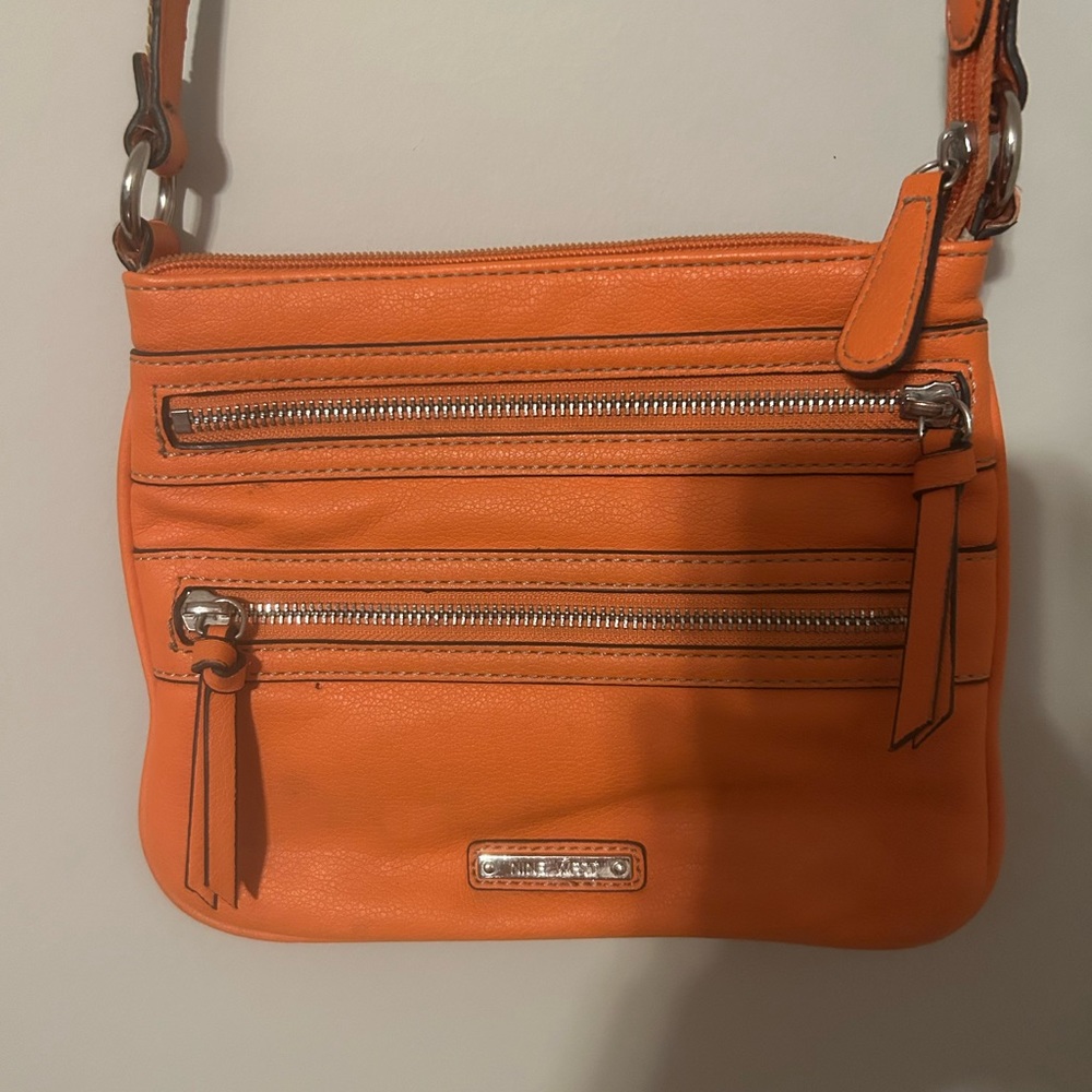 EUC Orange Nine West crossbody bag. Two zip pockets outside, one inside.